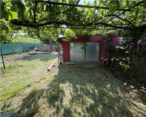Casa de vanzare in zona Tomesti + 1300 mp teren 54.990 euro